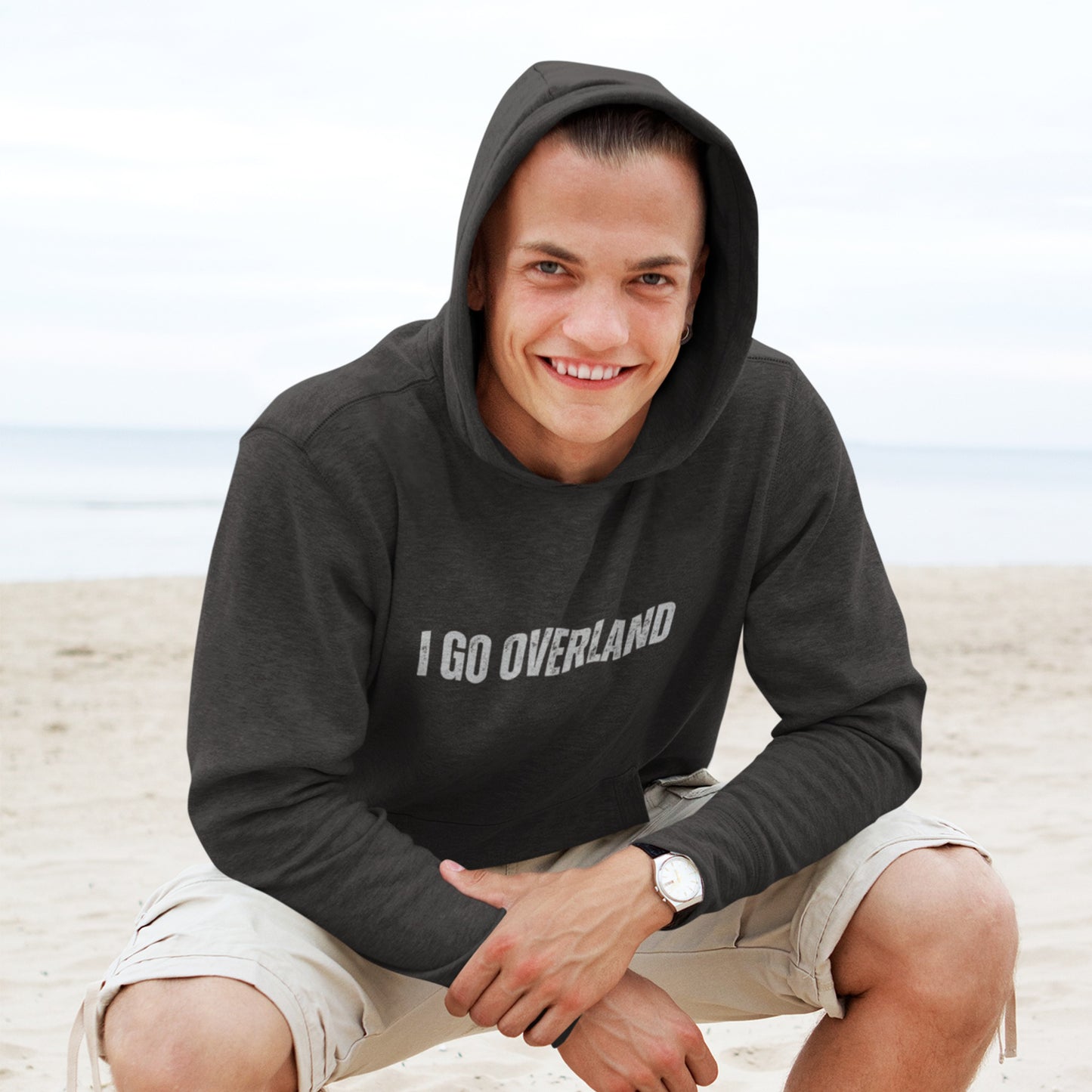 i go overland hoodie overland clothing man on beach