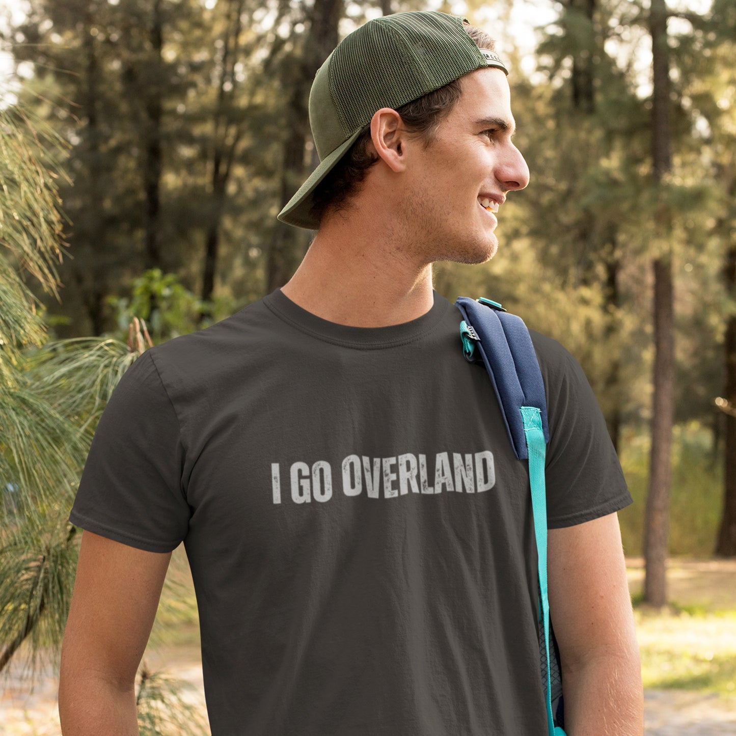 overland clothing i go overland tshirt worn by a happy man